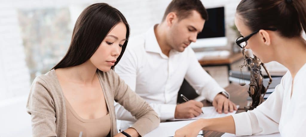 Woman and man file for marriage separation with lawyer